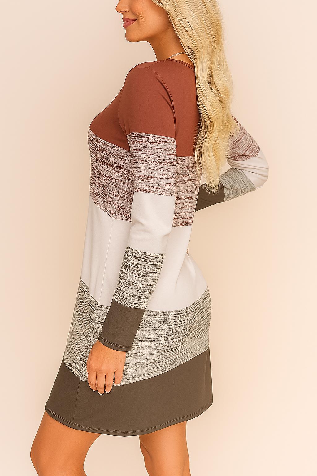 Rear side view of a woman wearing a colorblock long sleeve mini dress in warm autumn tones – stylish and flattering fit