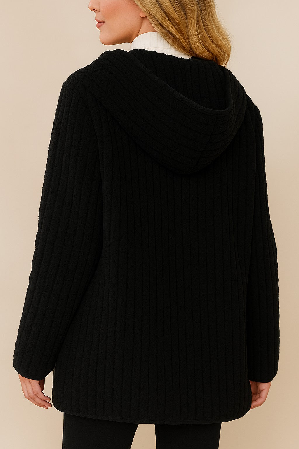 Back view of the black ribbed hooded coat with curved hem and full-coverage hood