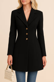 Centered front view of the black tailored longline coat with multi-button front and straight hem.