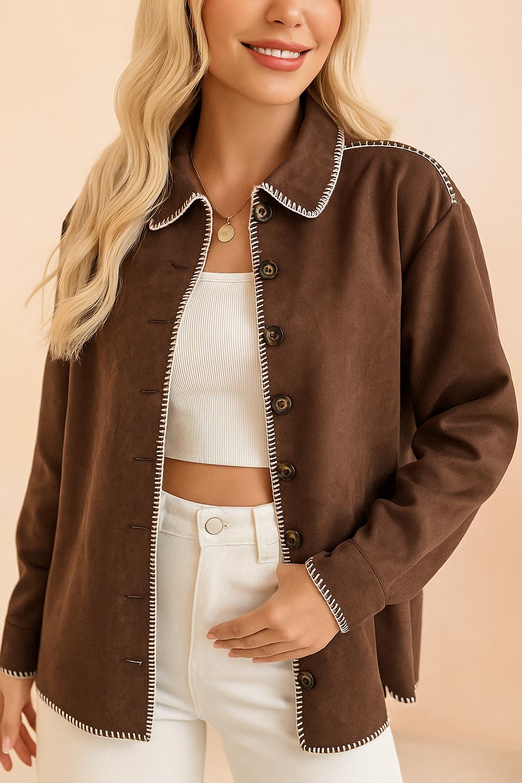 Front view of the brown faux-suede button-up shirt jacket worn open, showing the contrast whipstitch trim and long sleeves