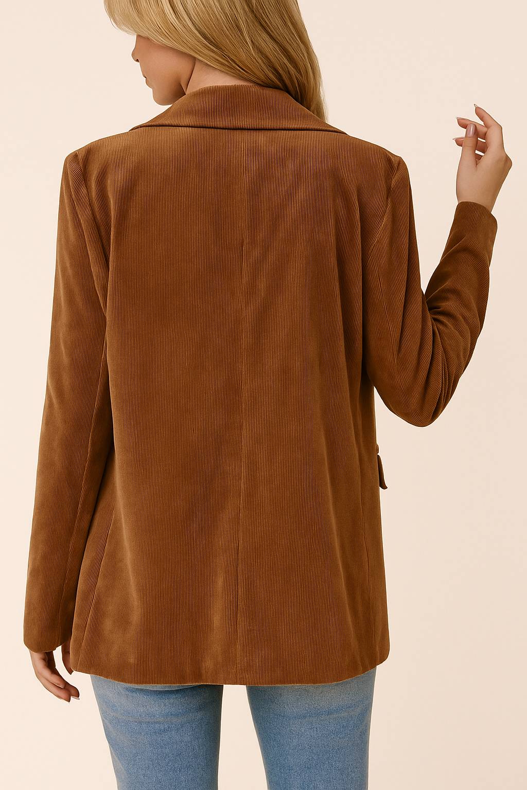 Back view of the camel brown corduroy blazer with a clean back panel, long sleeves and straight hem.