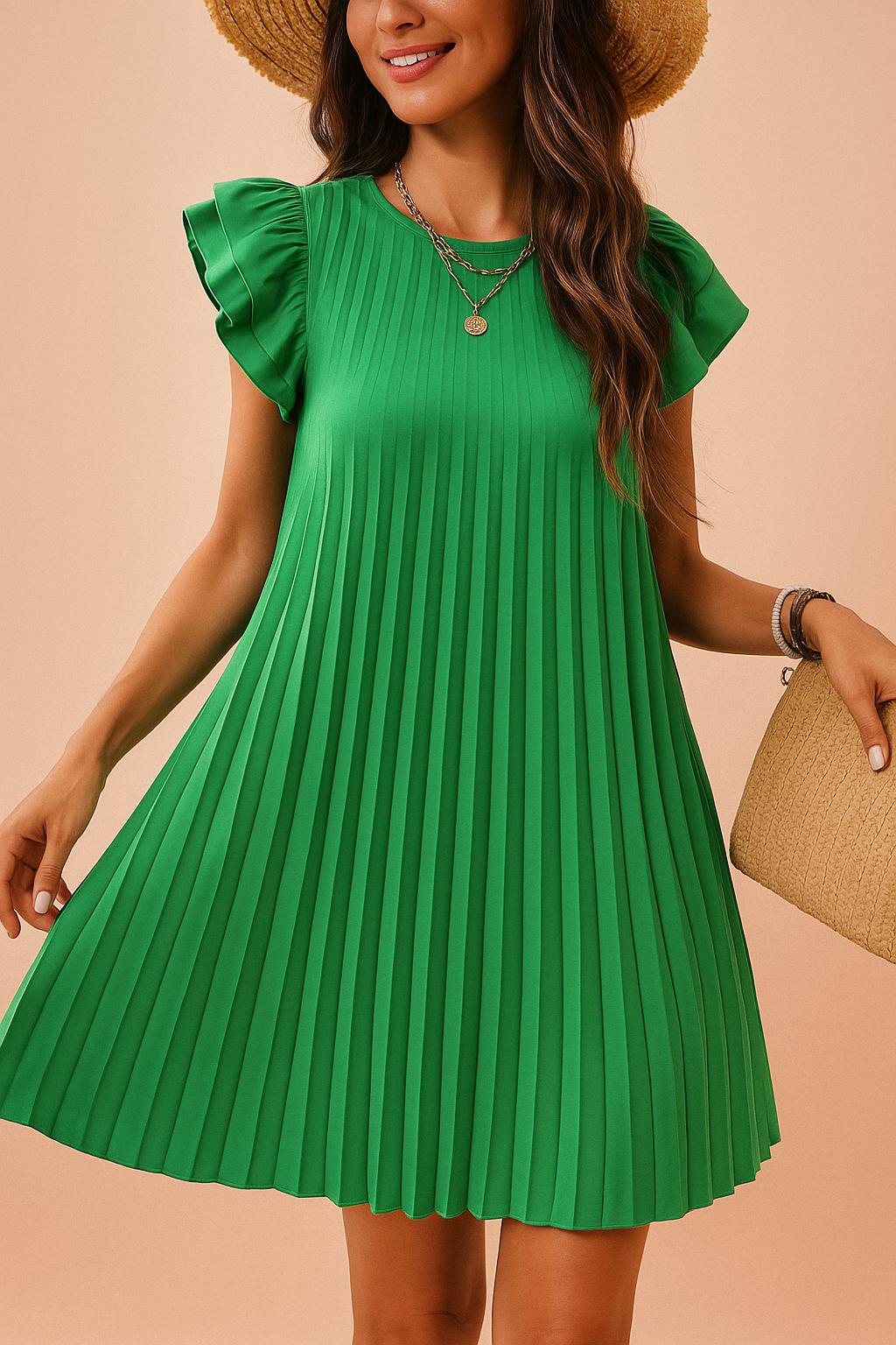 Close-up of pleated green dress with layered necklace and ruffle sleeve detail