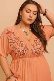 Coral frill maxi dress (plus size) showing embroidered V-neck bodice and empire-waist seam — front detail view