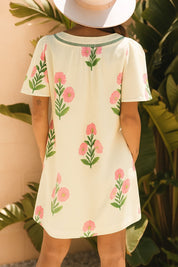 Cream floral-print mini dress with notched V-neck, flutter sleeves and easy relaxed drape — front view.