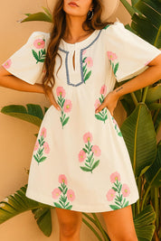 Cream floral-print mini dress with flutter sleeves and a clean straight mini hem — back view.