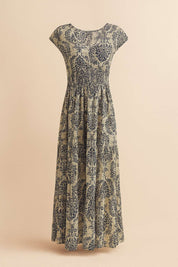 Dark-blue boho-print V-neck cap-sleeve maxi dress with smocked bodice and tiered skirt — hanger flatlay front view.