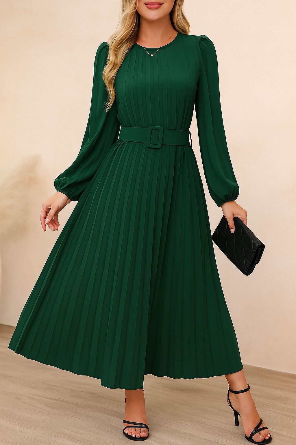 Dark-green belted pleated long-sleeve midi dress with crew neckline and flowing pleat skirt — front three-quarter view