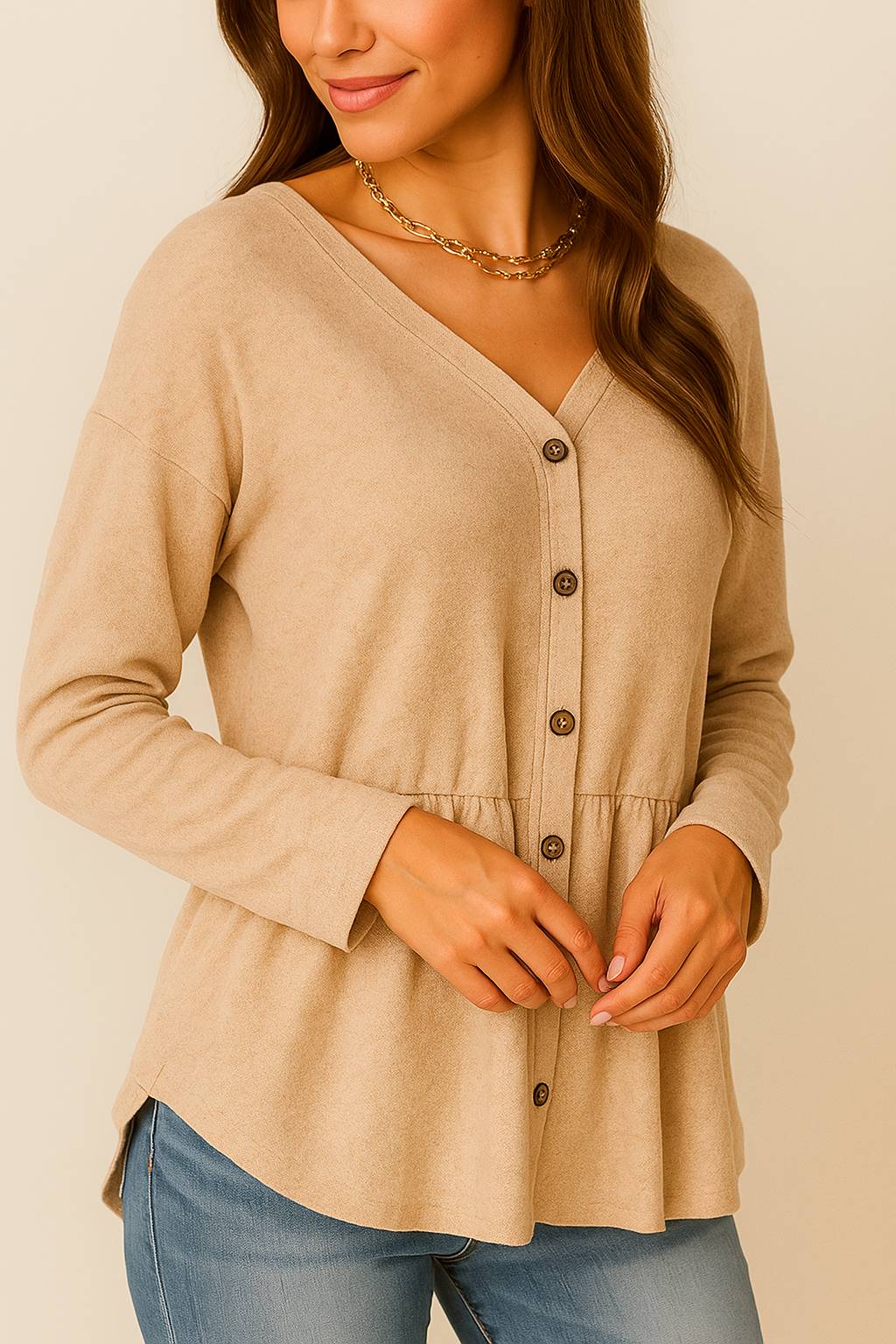 Centered front view of the dust-storm beige V-neck button-front long-sleeve top; relaxed drape and gentle waist gather.
