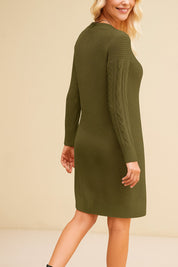 Woman wearing an olive green knitted dress against a beige background