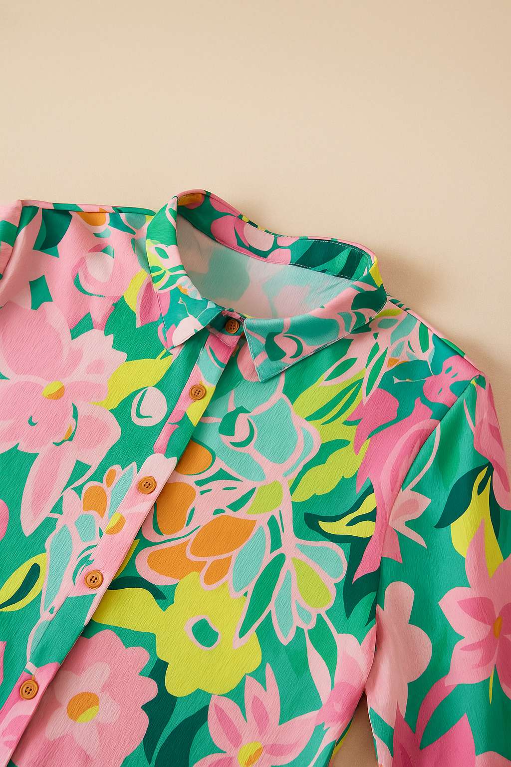 Floral button-down babydoll dress in green multi showing shirt collar and button placket — front detail view