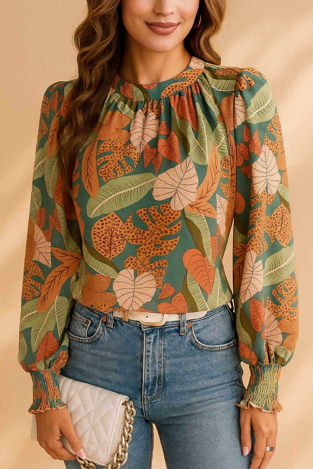 Green tropical leaf-print long-sleeve blouse with billowy sleeves and relaxed drape — front three-quarter view