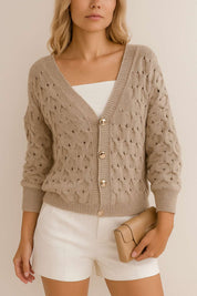 Centered front view of the khaki textured V-neck cardigan with gold-tone buttons and ribbed trims.