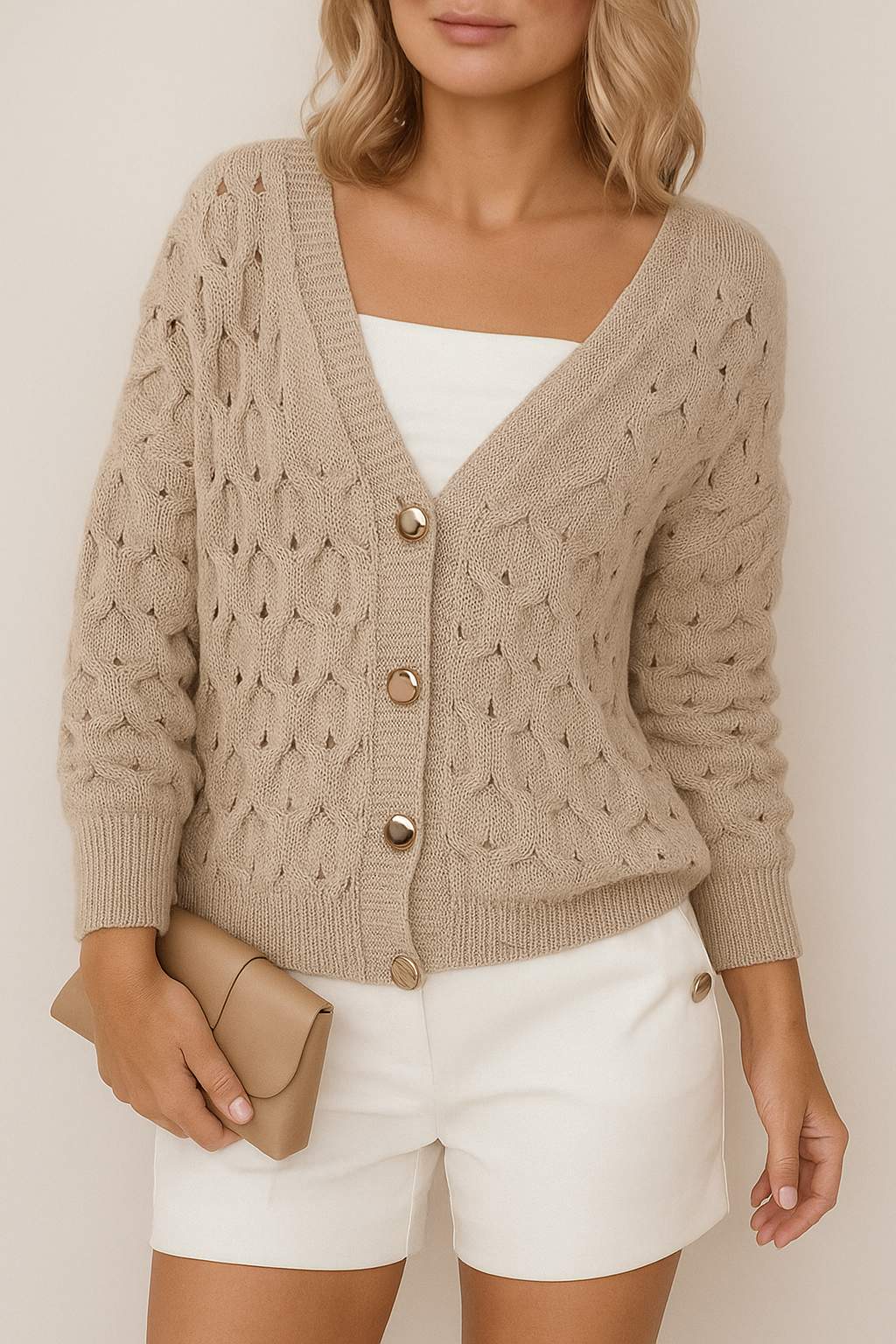 Front view of a women’s khaki textured V-neck cardigan with gold-tone button-front, balloon sleeves, and ribbed cuffs and hem.