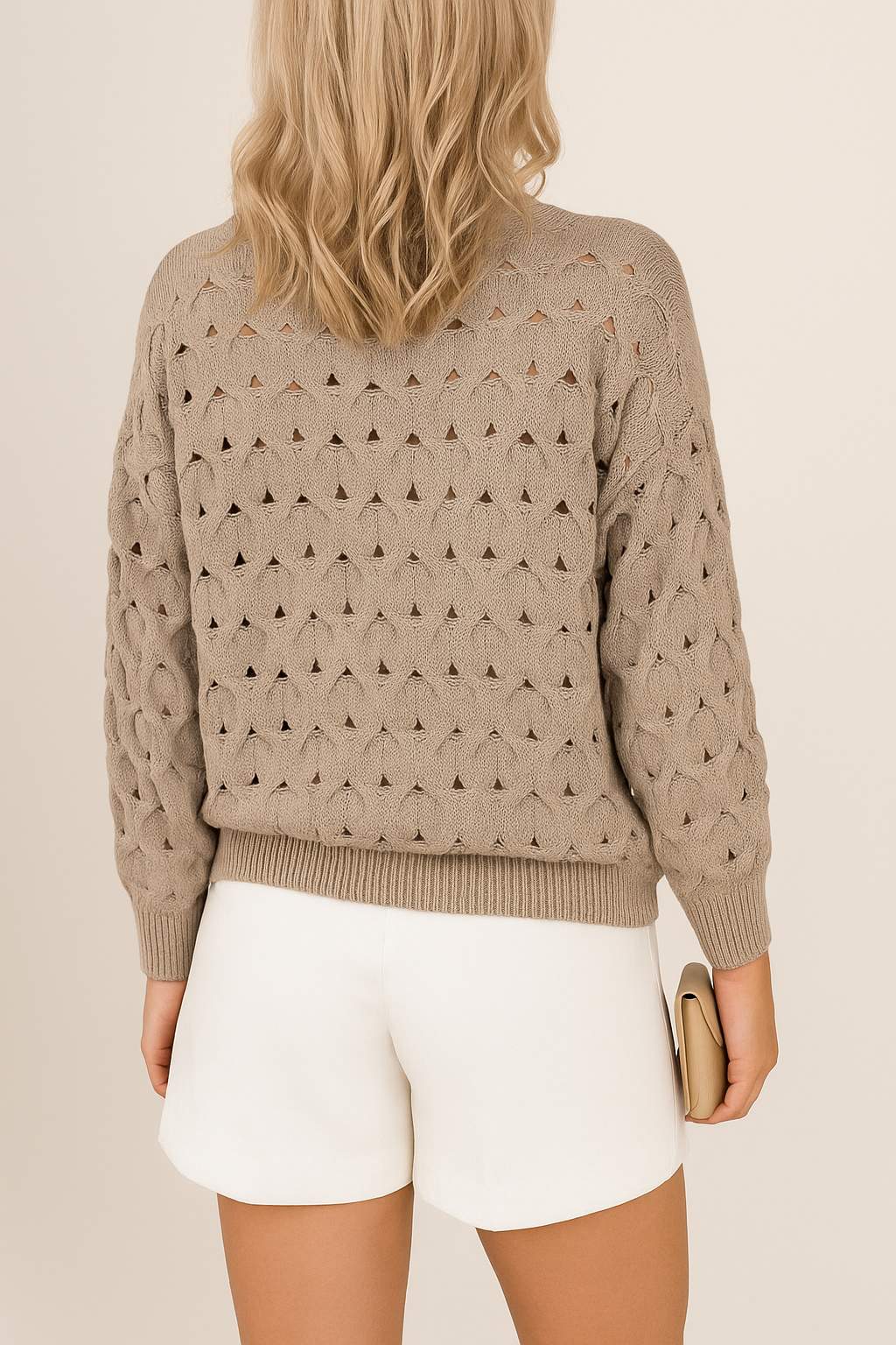 Back view of the khaki textured knit cardigan showing the open-stitch pattern and ribbed hem.