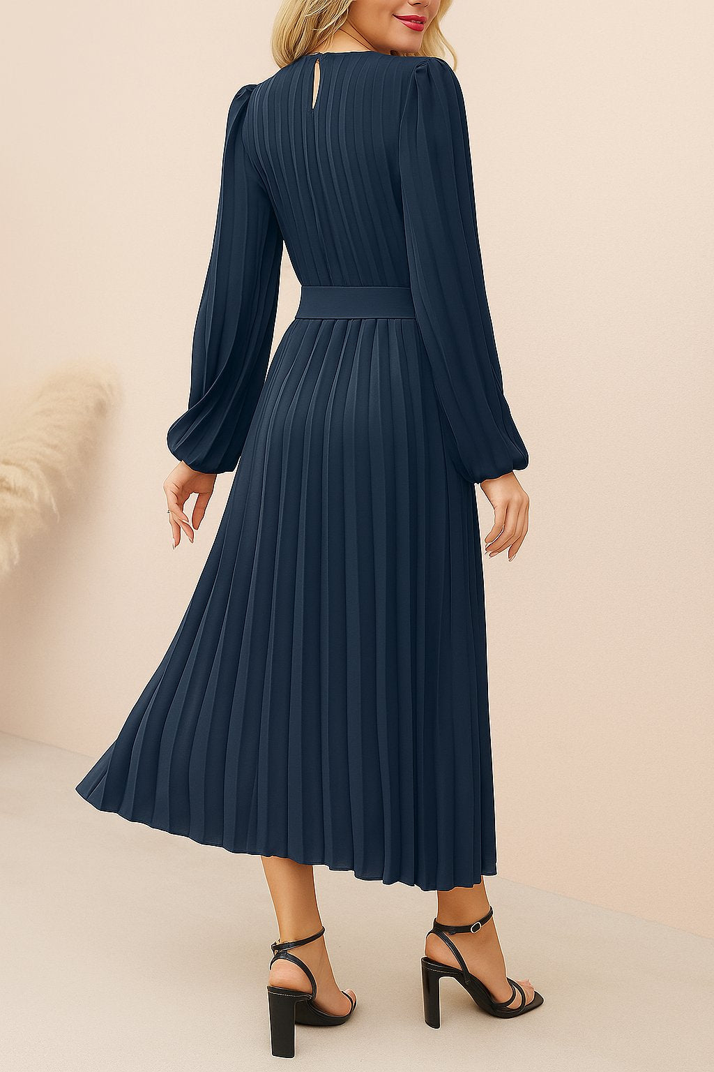 Navy-blue pleated long-sleeve midi dress with fitted waist and full pleat skirt — back view