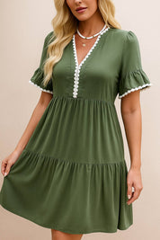 Olive green lace-trim mini dress with V-neckline, flounce sleeves and a softly fitted waist — front view