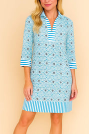 Pastel-blue floral tunic dress with striped trim and relaxed, lightweight drape — front view
