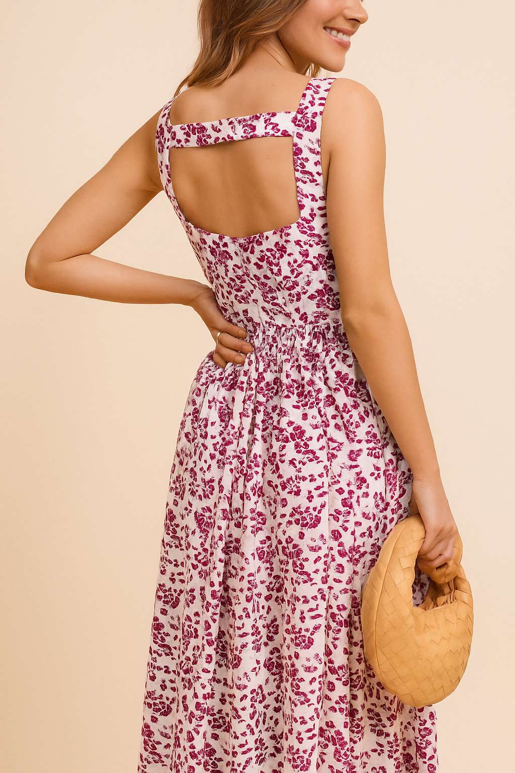 Pink-floral sleeveless maxi dress with square back cutout and gathered waist — back view.