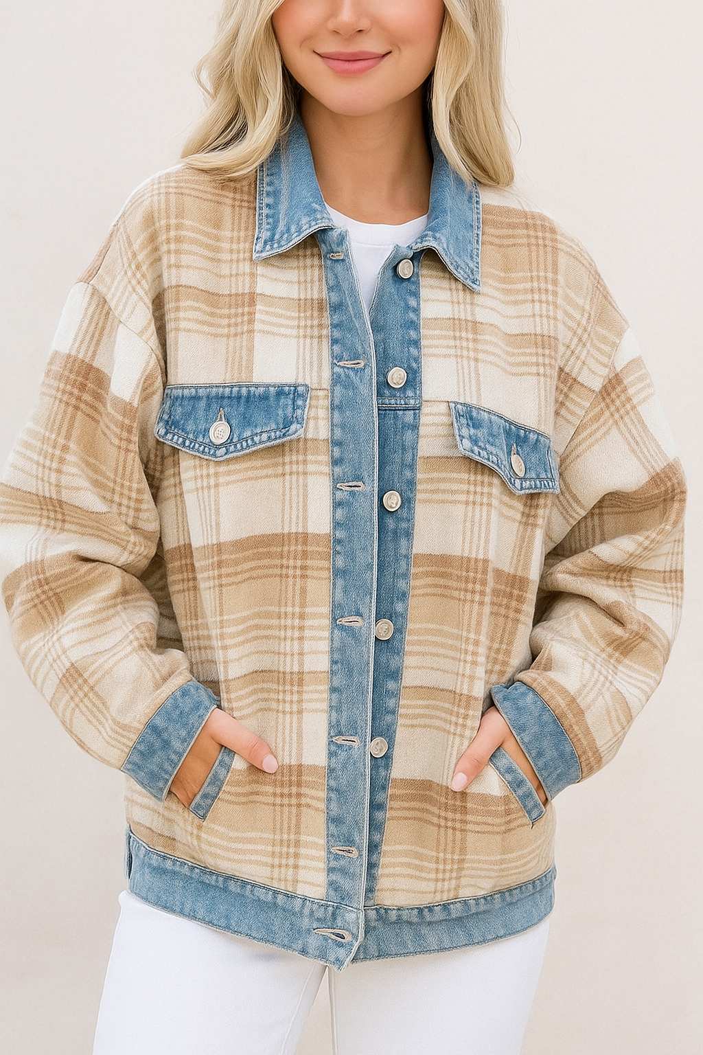 Straight-on front view of the plaid shacket featuring denim-trimmed collar and placket, chest flap pockets and side hand pockets.