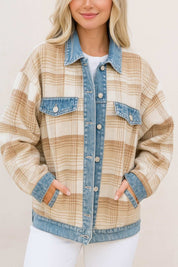 Straight-on front view of the plaid shacket featuring denim-trimmed collar and placket, chest flap pockets and side hand pockets.