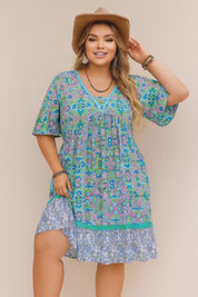Plus-size sky-blue boho-print dress with lace-trim V-neckline, short sleeves and ruffled hem — studio lookbook video