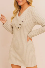 Short lookbook video showcasing a women’s ribbed knit sweater dress with an asymmetric foldover V-neck collar and three-button detail, long sleeves and vertical ribbing, shown in clean studio lighting.