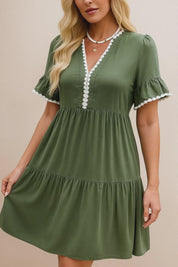 Olive green lace-trim mini dress with flounce short sleeves and tiered mini skirt — studio lookbook video