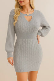 Short lookbook video showing the cable-knit cutout sweater dress in heather gray, wine and camel brown from front, three-quarter and back views in studio lighting.