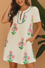 Cream floral-print flutter-sleeve mini dress with notched V-neck and side pockets — studio lookbook video.