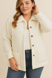 Short lookbook video of a white fuzzy collared button-down jacket with drop-shoulder sleeves and front patch pockets, shown in studio lighting.