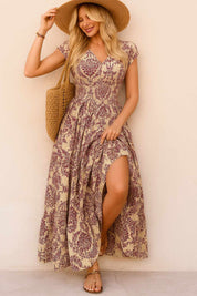 Women’s purple boho-print V-neck cap-sleeve maxi dress with smocked waist and tiered skirt — front view