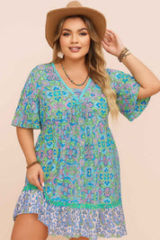 Plus-size sky-blue boho-print dress with lace-trim V-neck and gathered bodice, relaxed drape — front view.