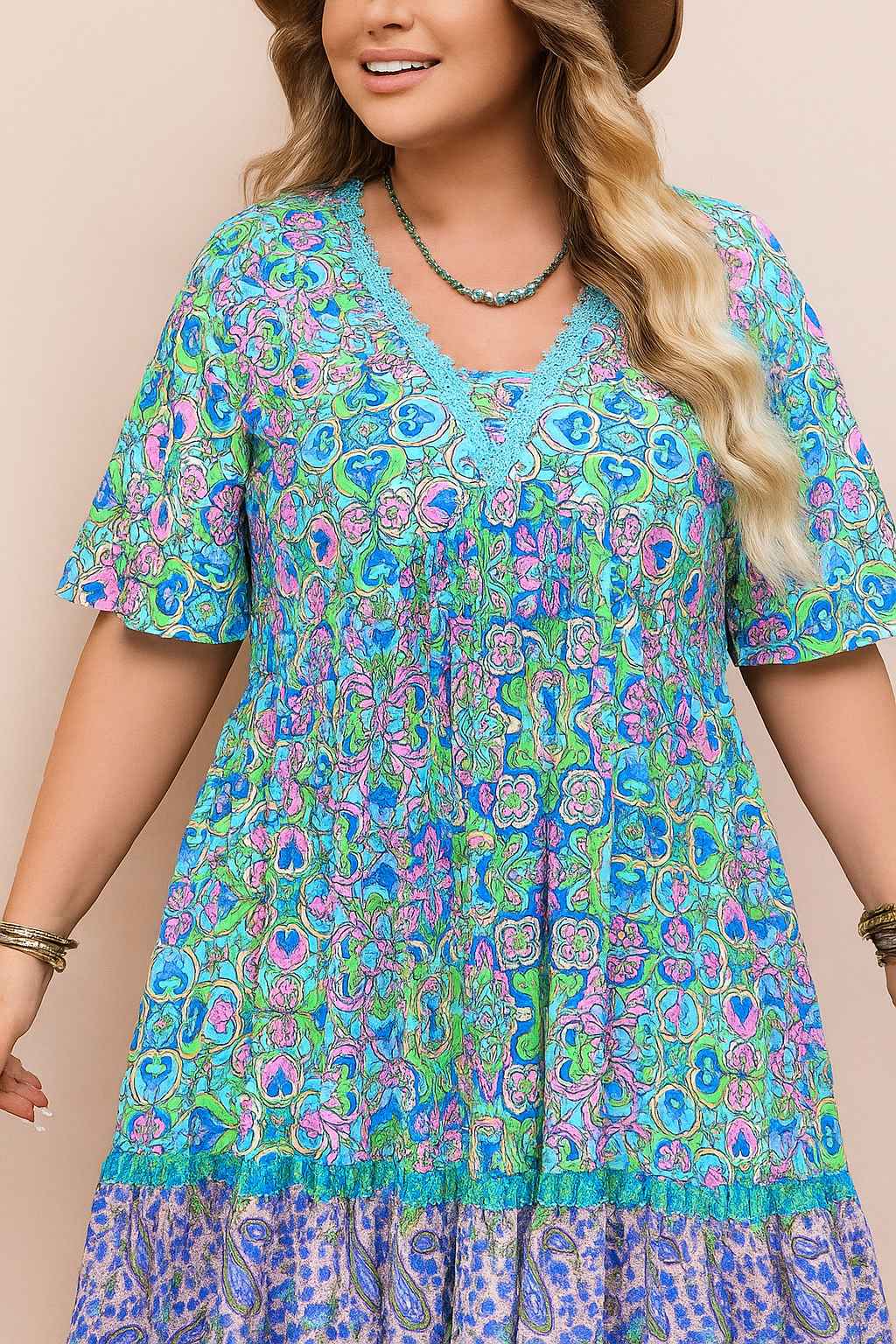 Plus-size sky-blue boho-print dress with lace-trim V-neck and gathered bodice, relaxed drape — front view.