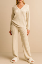 Tan ribbed knit V-neck lounge set with long-sleeve sweater and elastic-waist straight-leg pants — centered front view.