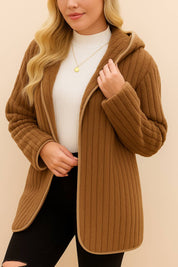 Back detail view of the taupe ribbed hooded coat showing hood shape and channel ribs