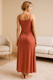 Back view of terracotta nightgown with thin straps — soft, flowy silhouette and elegant drape