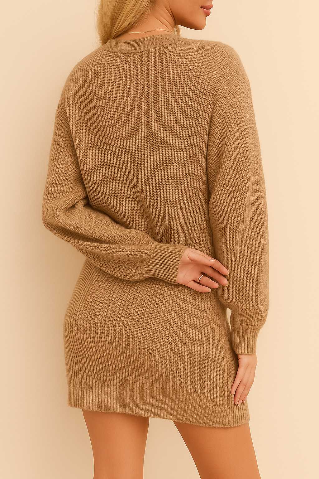 Back view of the women’s waffle-knit henley sweater dress showing the cozy texture, dropped shoulders, long sleeves and ribbed hem that skims above the knee for a relaxed silhouette.