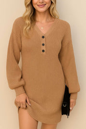 Front view of a women’s henley sweater dress featuring a V-neck with three buttons, long balloon sleeves, ribbed cuffs and hem, and a comfortable straight fit for everyday wear.