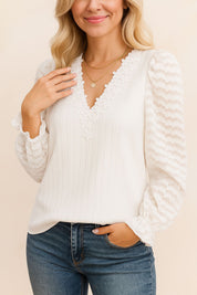 Women’s white lace-trim V-neck blouse with ribbed body and sheer textured long sleeves with elastic cuffs — front view