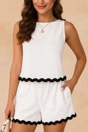 Centered front view of the white ric-rac trim tank and high-waist shorts set; black wave hem and side pockets visible.