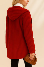 Back view of the wine ribbed hooded coat showing the hood and vertical rib texture