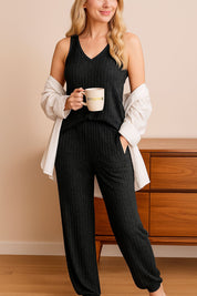 Women's black ribbed knit loungewear pajama set with sleeveless top and jogger pants, casual and comfortable outfit