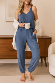 Women's comfortable blue loungewear pajama set with sleeveless top and pants, perfect for relaxing at home