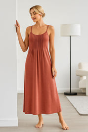 Full-length view of women’s terracotta nightgown with pleated front and spaghetti straps — breathable loungewear for home or sleep