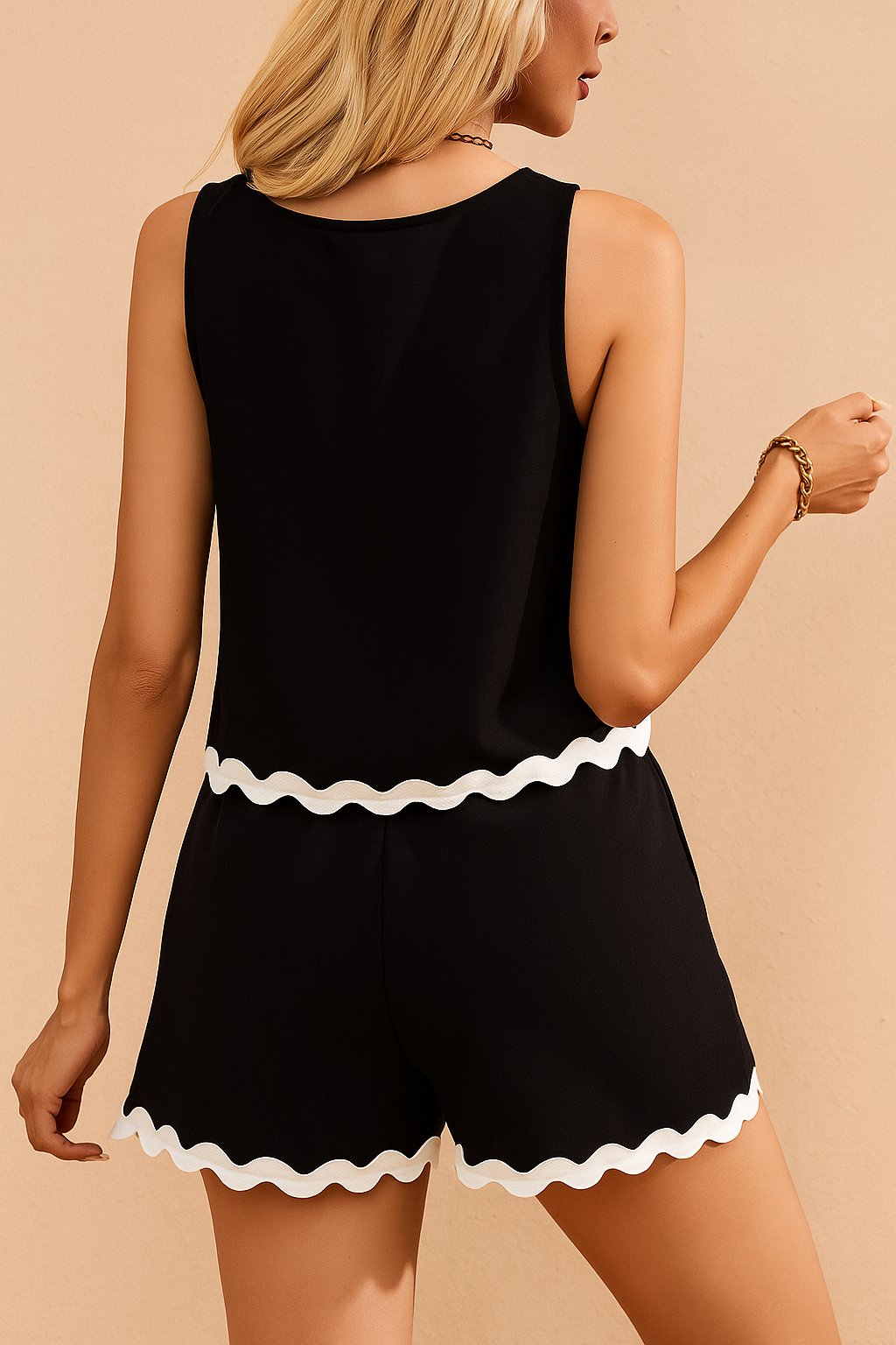 Back view of the black ric-rac trim tank and shorts set showing wave hem on top and shorts.