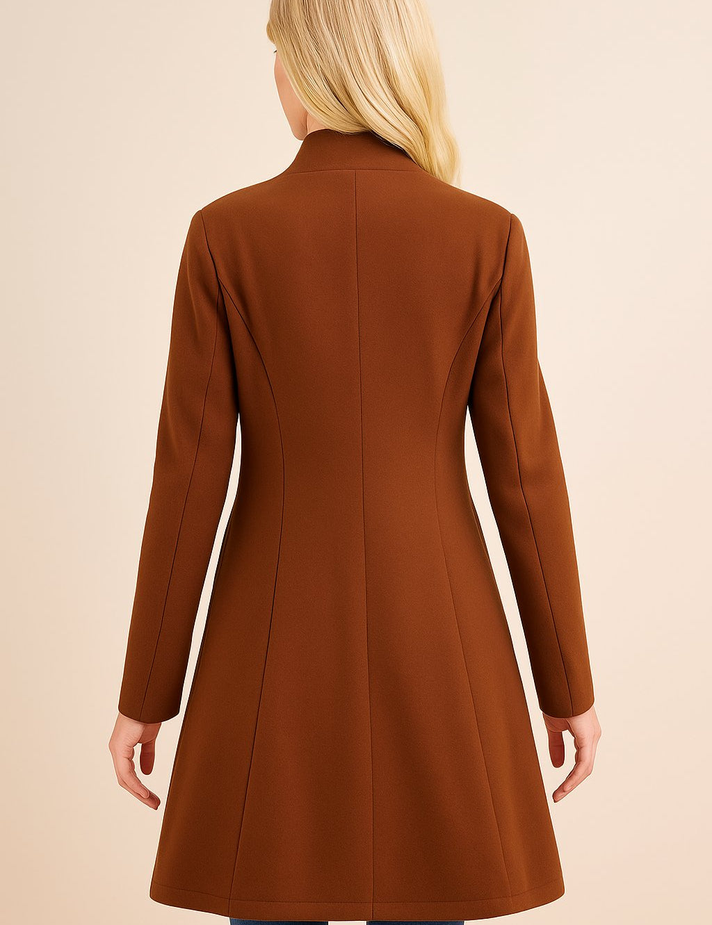 Back view of the brown tailored longline coat showing the clean panel seams, structured shoulders and straight hem.