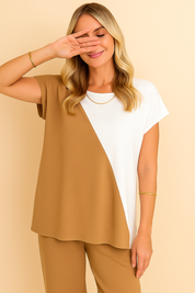 “Front three-quarter view of the camel two-tone round-neck top and wide-leg pants set showing the diagonal colorblock panel and relaxed drape.