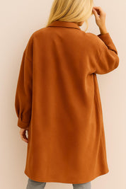 Back view of the caramel textured longline coat with drop-shoulder seam and a rounded straight hem.