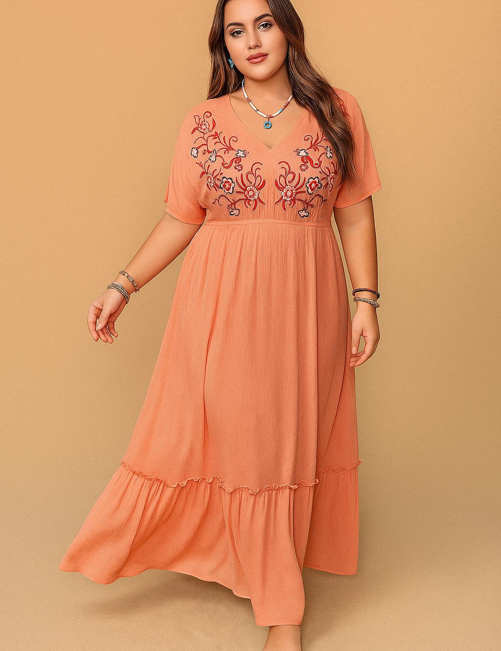 Plus-size coral embroidered V-neck frill maxi dress with empire waist and tiered frill hem — front view