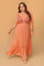 Plus-size coral embroidered V-neck frill maxi dress with empire waist and tiered frill hem — front view